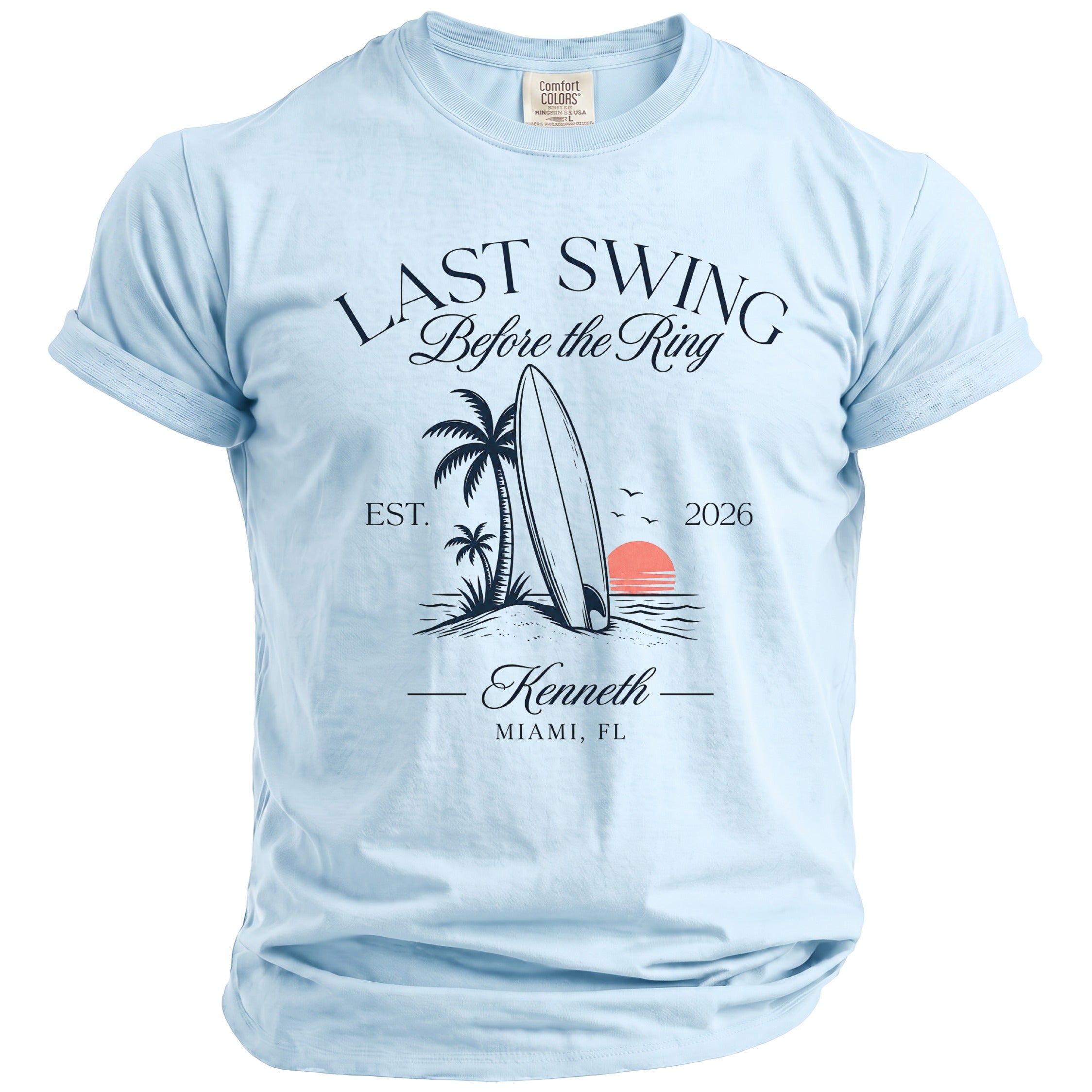Light blue t-shirt with "LAST SWING Before the Ring" and beach scene.
