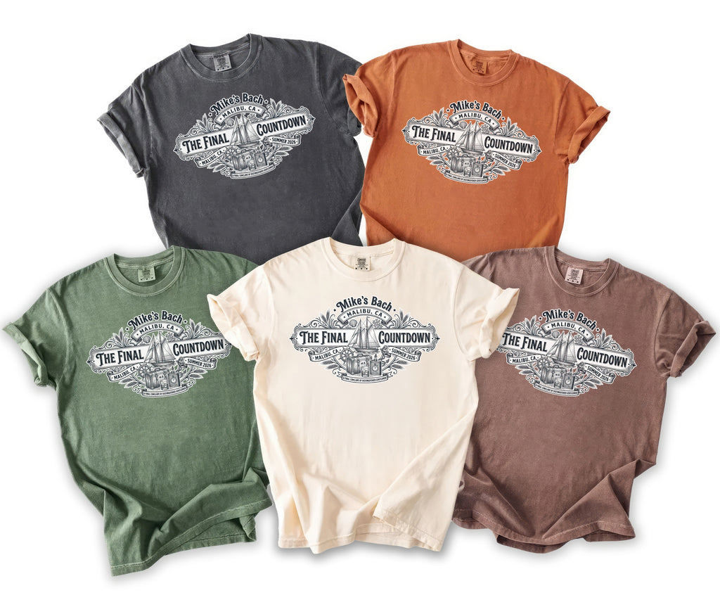 Five t-shirts in various colors with a "Mike's Bach" countdown graphic.
