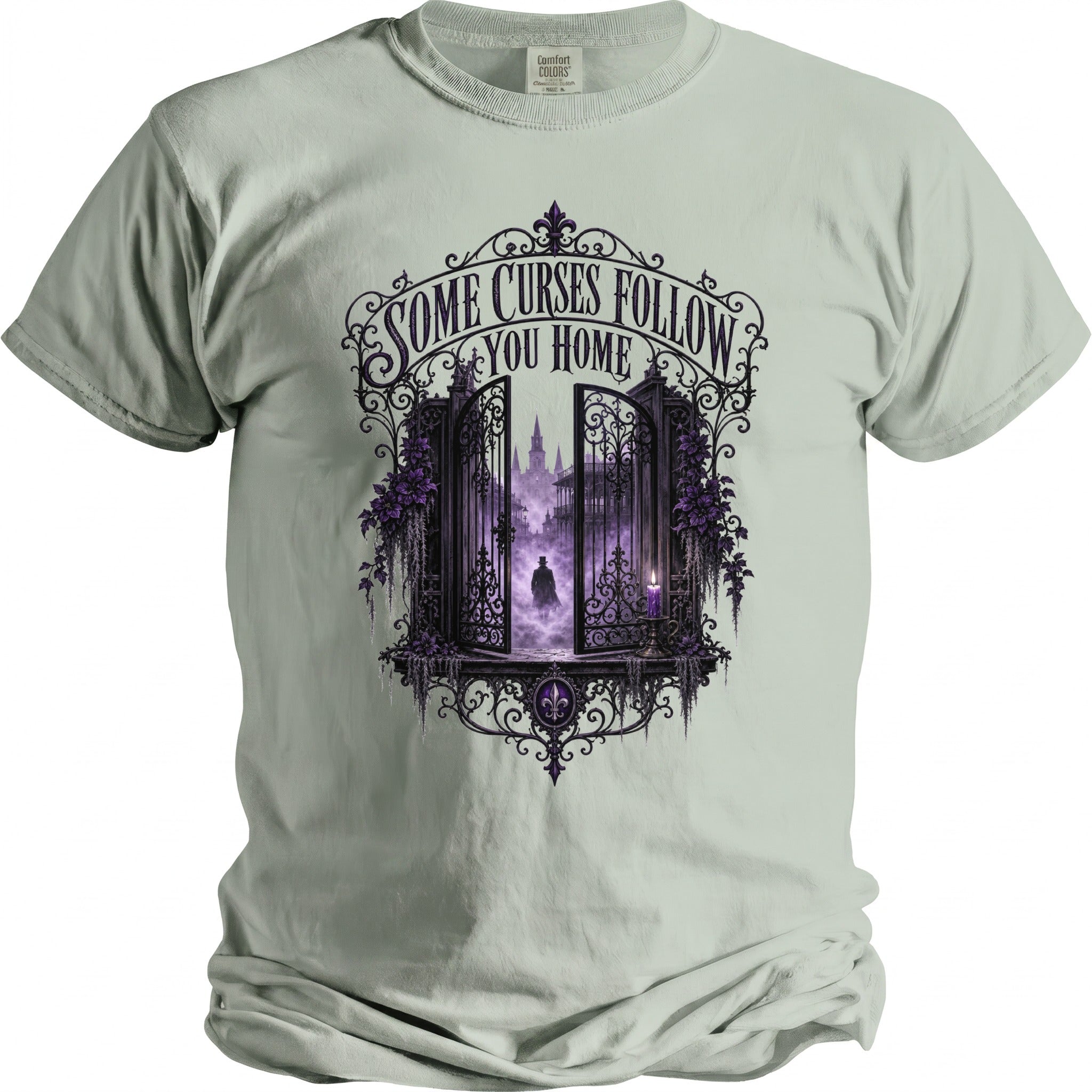 T-shirt with "Some Curses Follow You Home" text and a dark, gothic gate illustration.