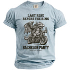 Light blue t-shirt with a dragon riding a motorcycle and text.