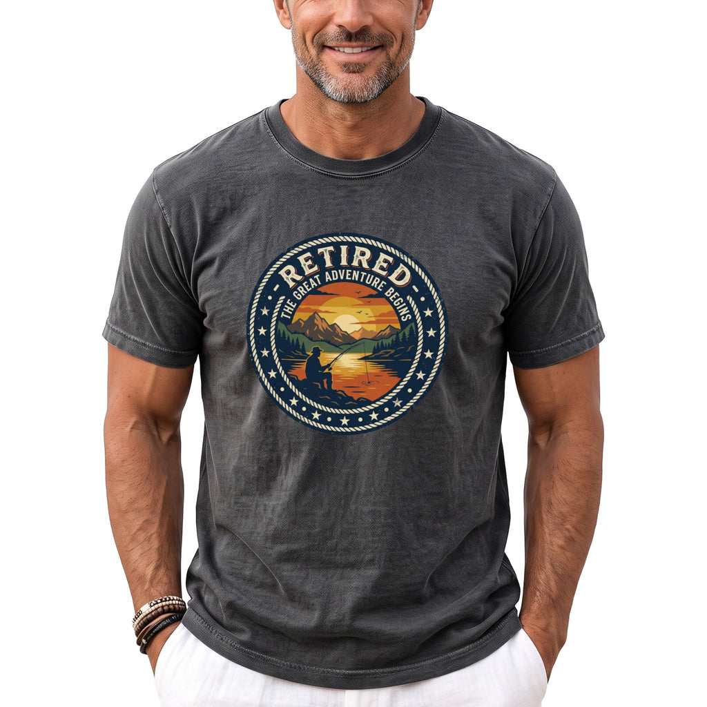 Dark gray t-shirt with circular graphic "Retired The Great Adventure Begins" and fishing scene.