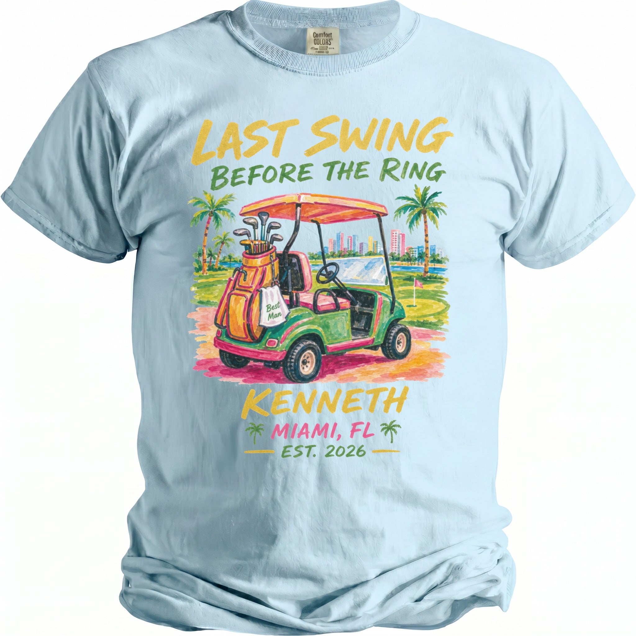 Light blue t-shirt with "Last Swing Before the Ring" and "Kenneth Miami, FL Est. 2026" text.