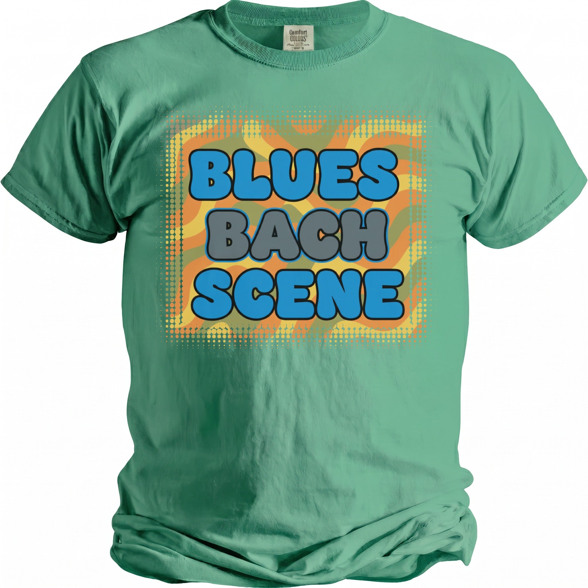 Green t-shirt with "BLUES BACH SCENE" text and abstract colorful graphic.