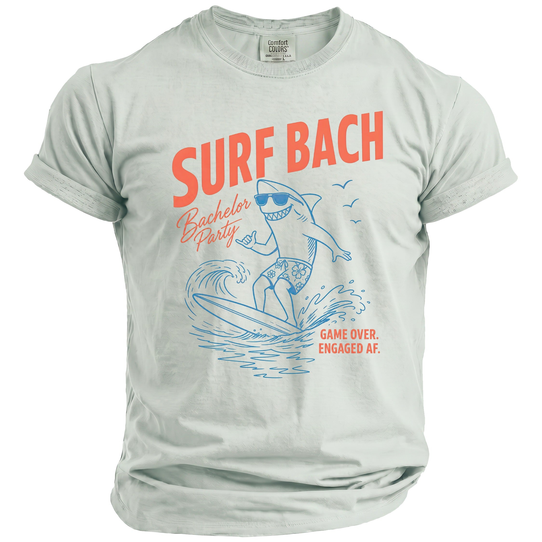 Surf Bach Bachelor Party graphic t-shirt with a shark surfing on a wave.