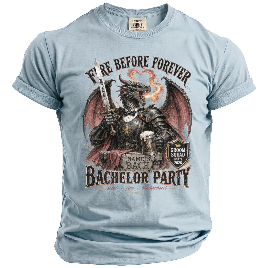 Light blue t-shirt with dragon graphic, sword, beer, and text: "FIRE BEFORE FOREVER, [NAME]'S BACHELOR PARTY"