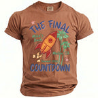 Brown t-shirt with graphic: The Final Countdown, rocket, palm trees, Malibu, CA.