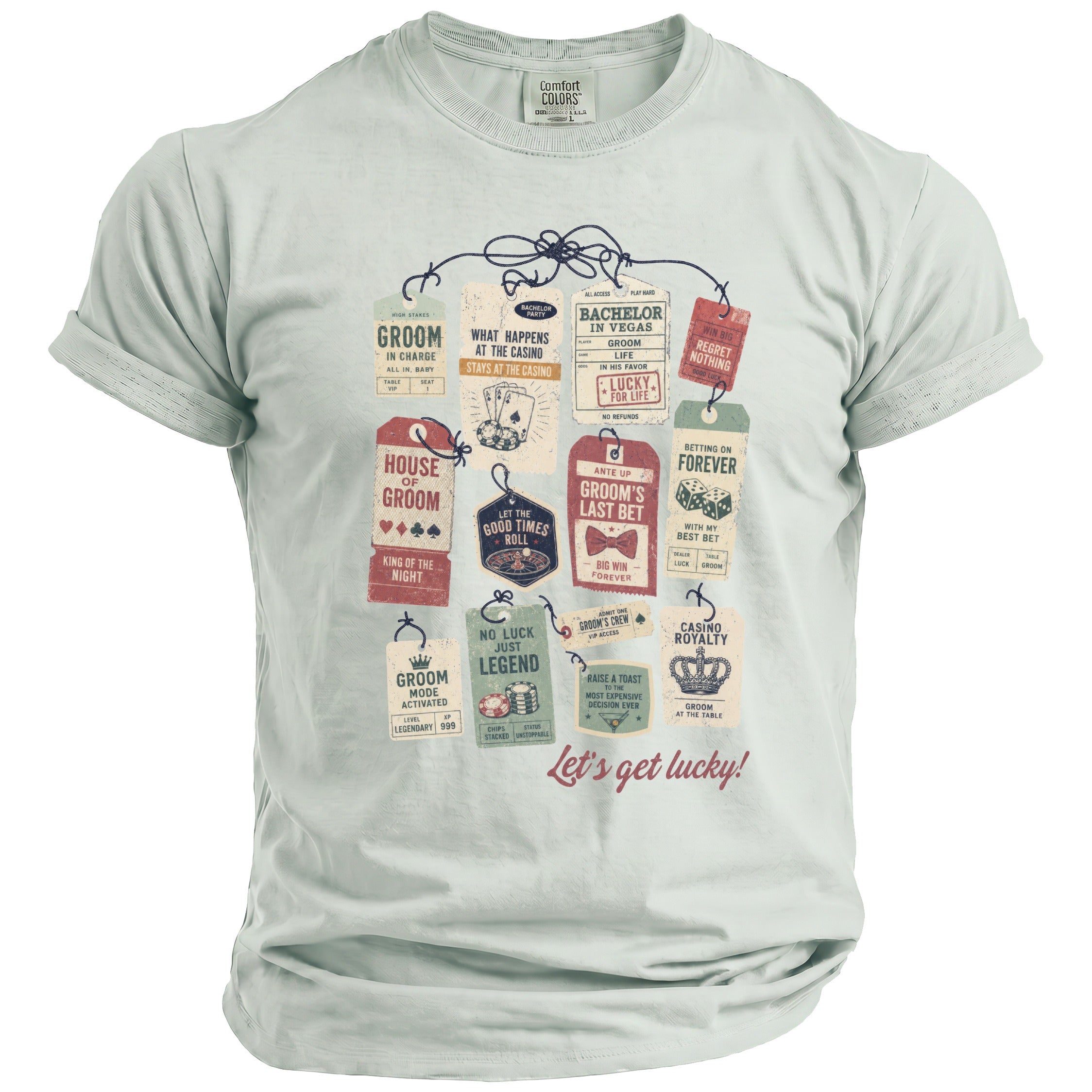 Light green t-shirt with gambling-themed tags: "Bachelor in Vegas", "Groom's Last Bet", and "Casino Royalty."