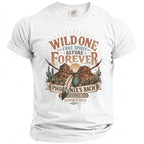 White t-shirt with graphic art featuring desert landscape, text "Wild One Free Spirit Before Forever Phoenix's Bach Sedona, AZ Summer 2026".