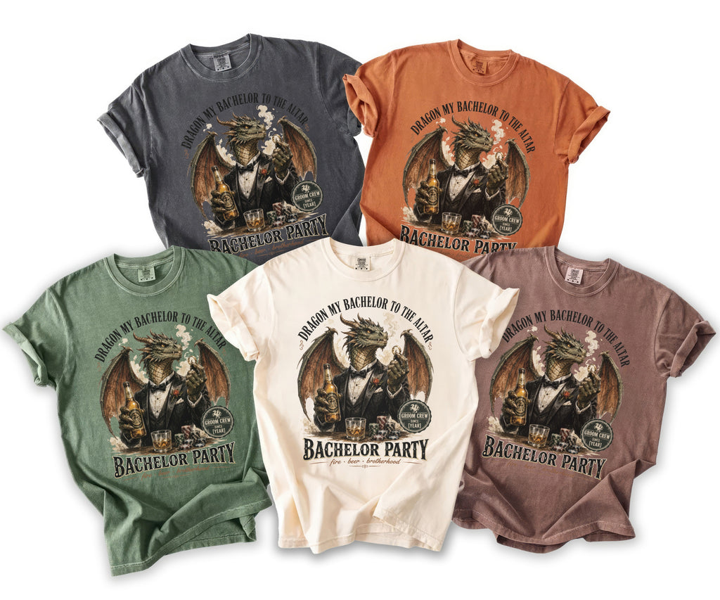 Five t-shirts in different colors with a dragon graphic and "Dragon my bachelor to the altar" text.
