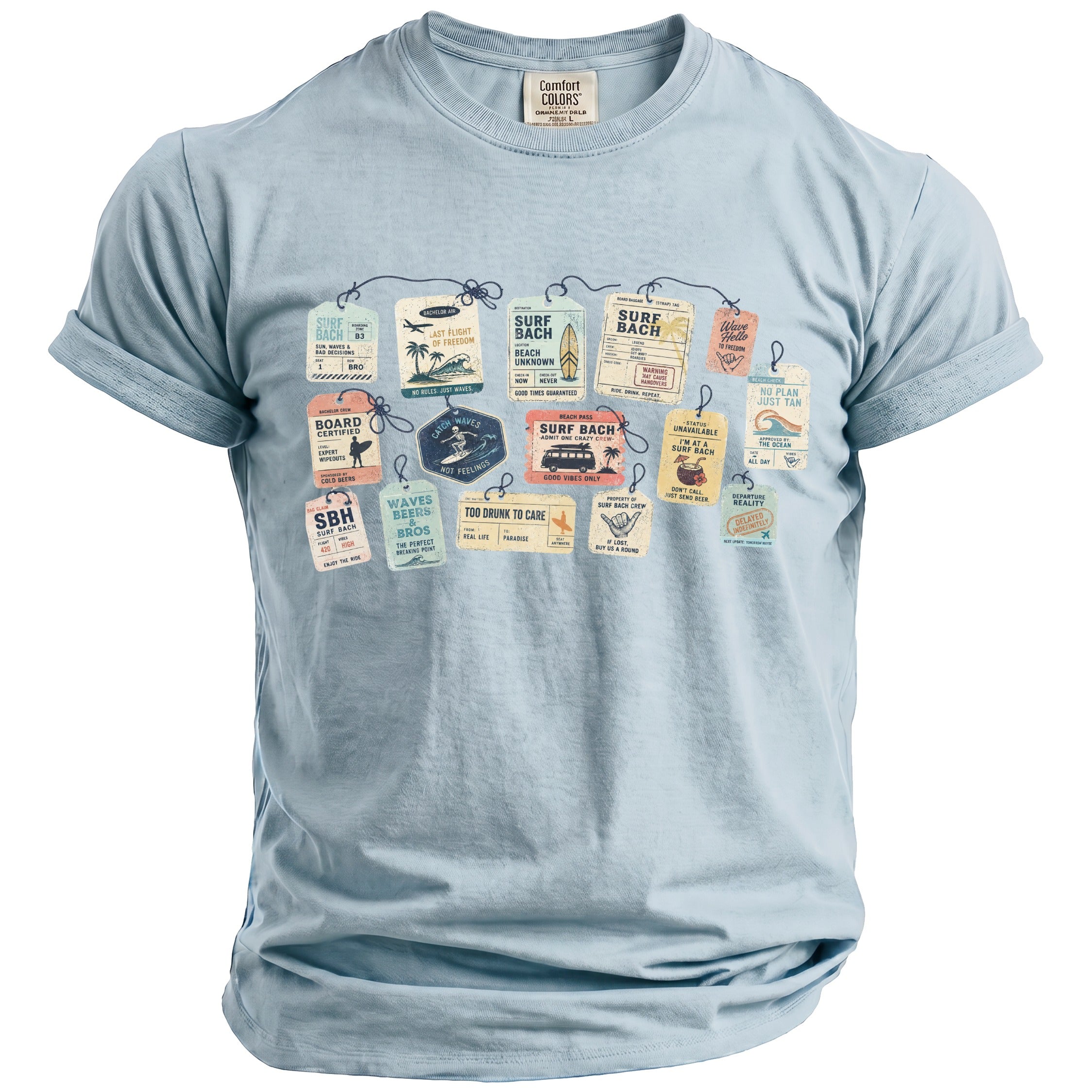 Light blue t-shirt with a graphic of various luggage tags with surf and beach-themed text.