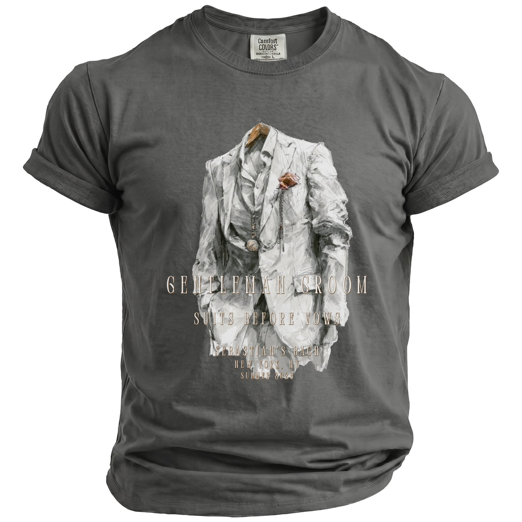 Gray t-shirt with watercolor print of a white suit, pocket watch, and text.