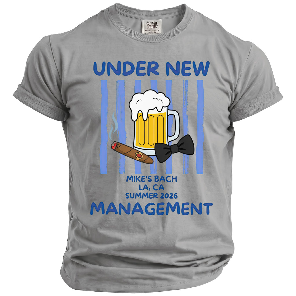 Grey t-shirt with "Under New Management" and beer, cigar, bow tie graphics for "Mike's Bach LA, CA Summer 2026".