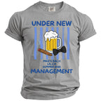 Grey t-shirt with "Under New Management" and beer, cigar, bow tie graphics for "Mike's Bach LA, CA Summer 2026".