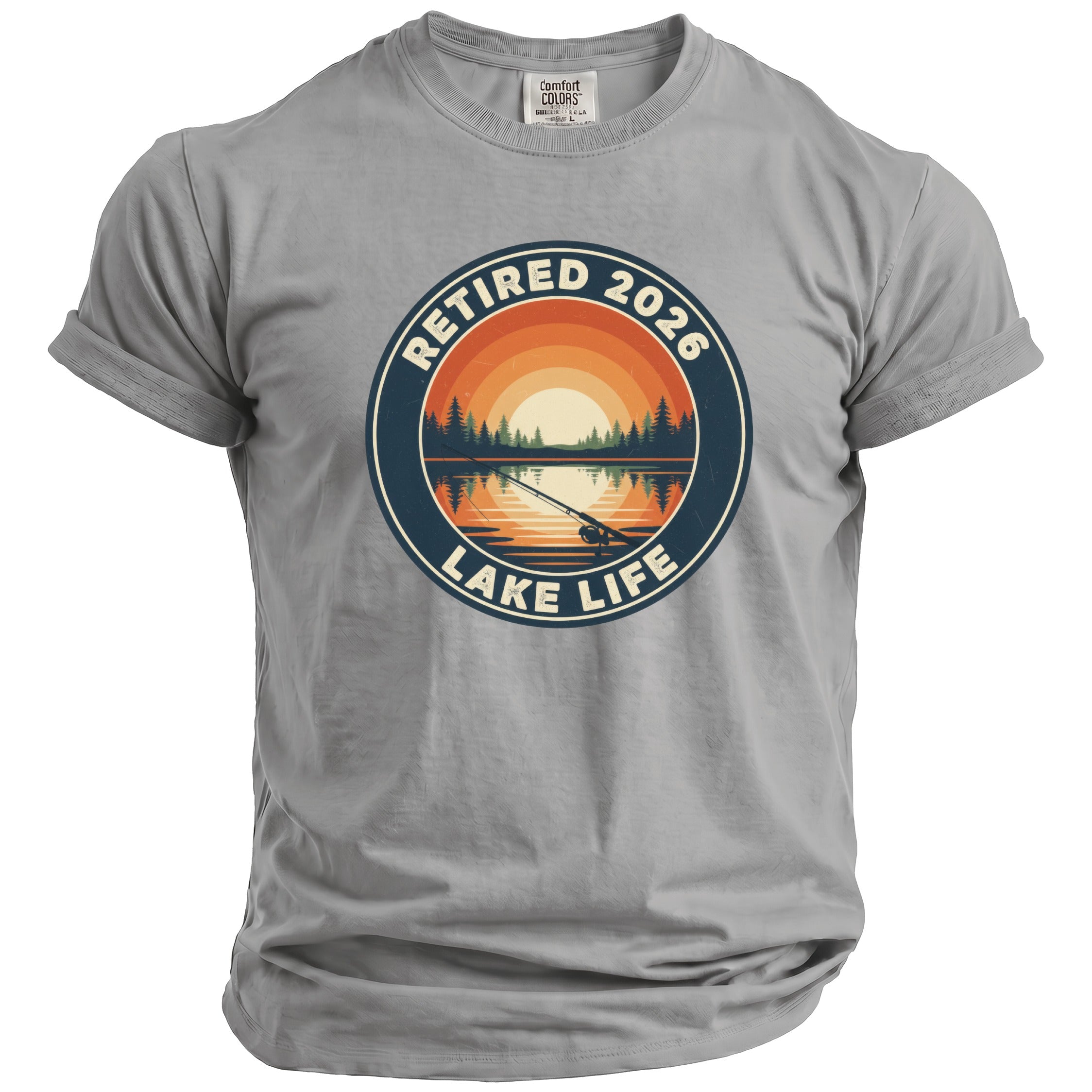 Gray t-shirt with circular graphic: "Retired 2026 Lake Life," fishing rod on lake at sunset.