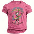 Pink t-shirt with "Last Swing Before the Ring Bachelor Weekend 2026" text and golfer graphic.