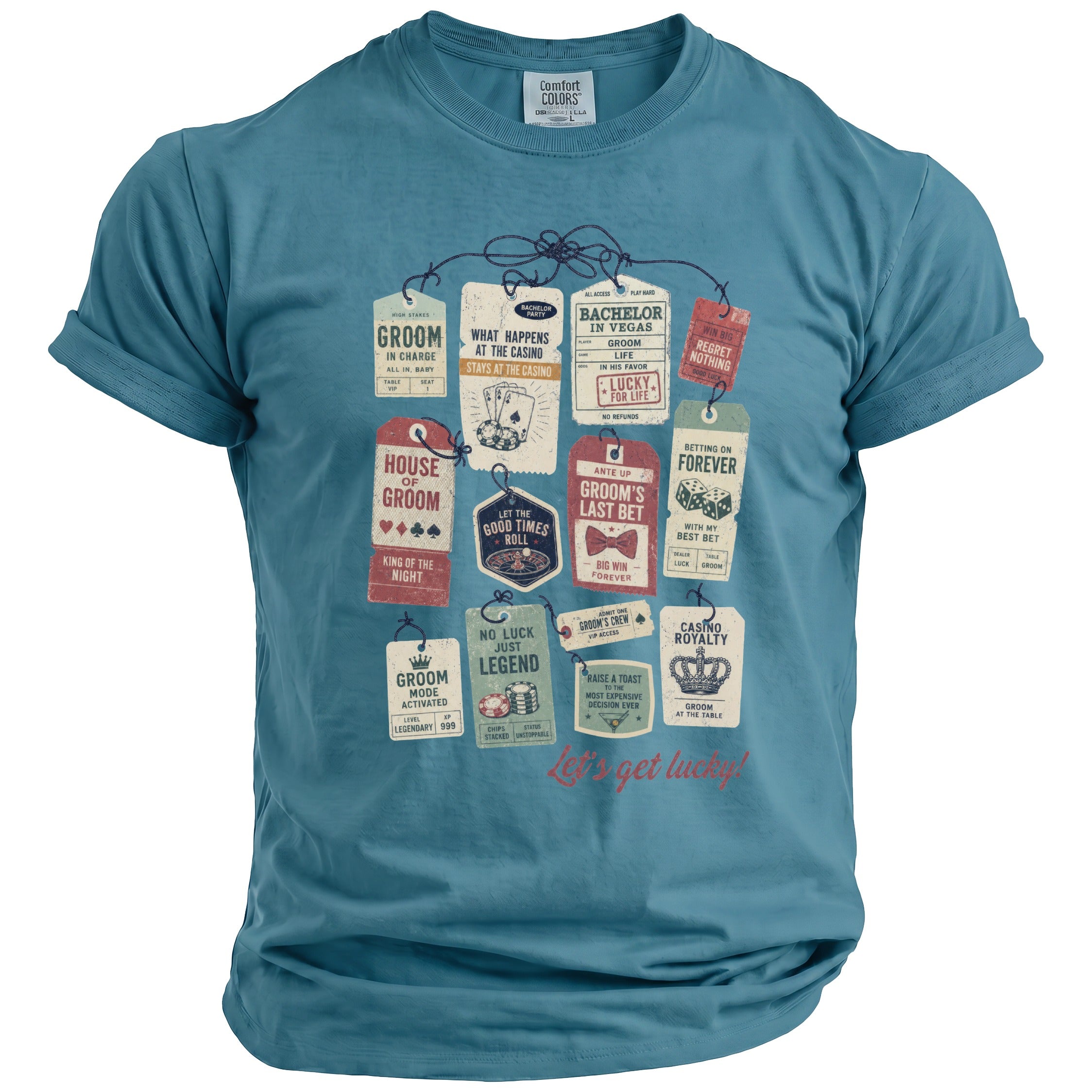 Blue t-shirt featuring casino-themed tags with groom-related phrases and graphics.