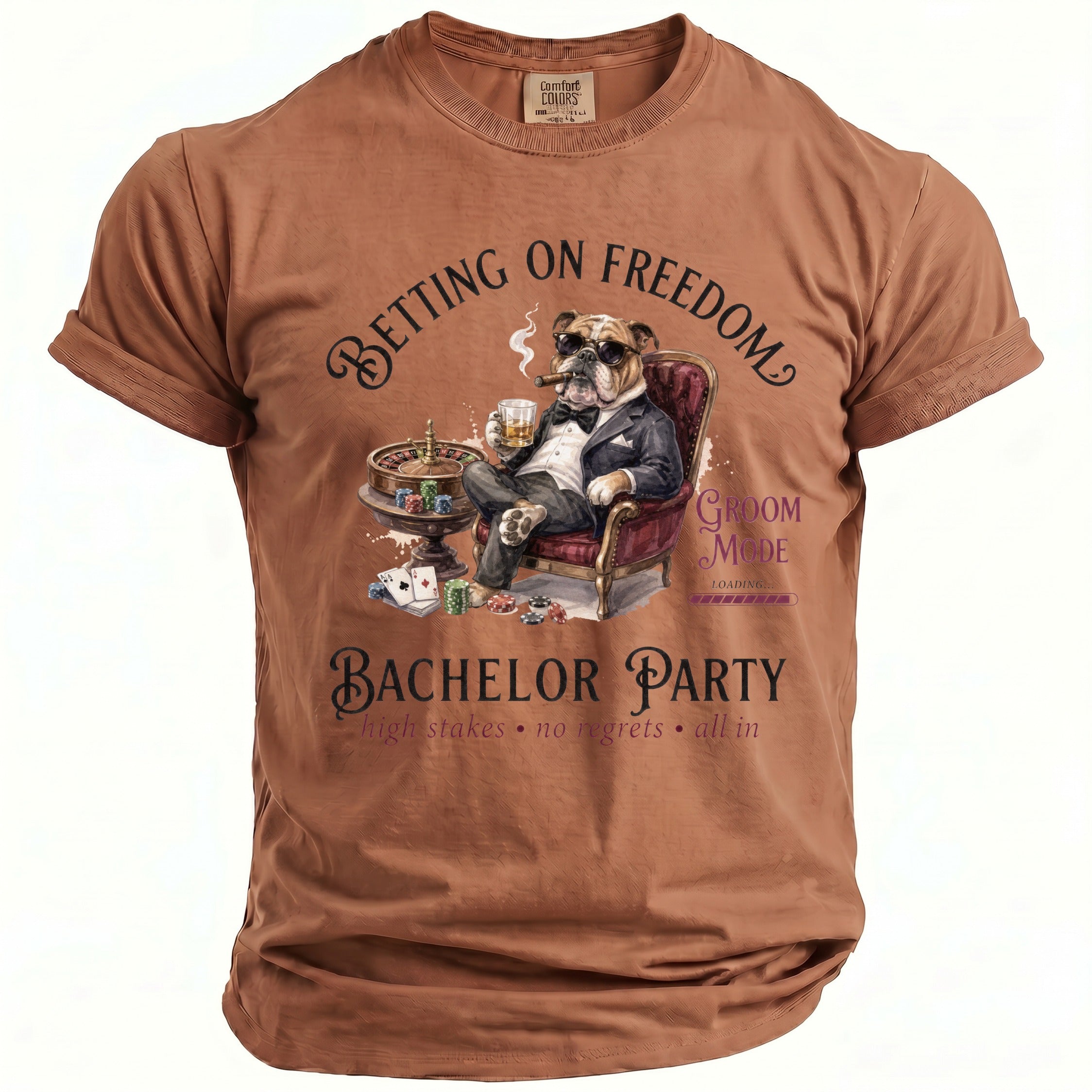 Brown t-shirt with "Betting on Freedom Groom Mode Bachelor Party" text and bulldog graphic.
