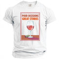White t-shirt with "Pour Decisions Great Stories" text and wine glass graphic.