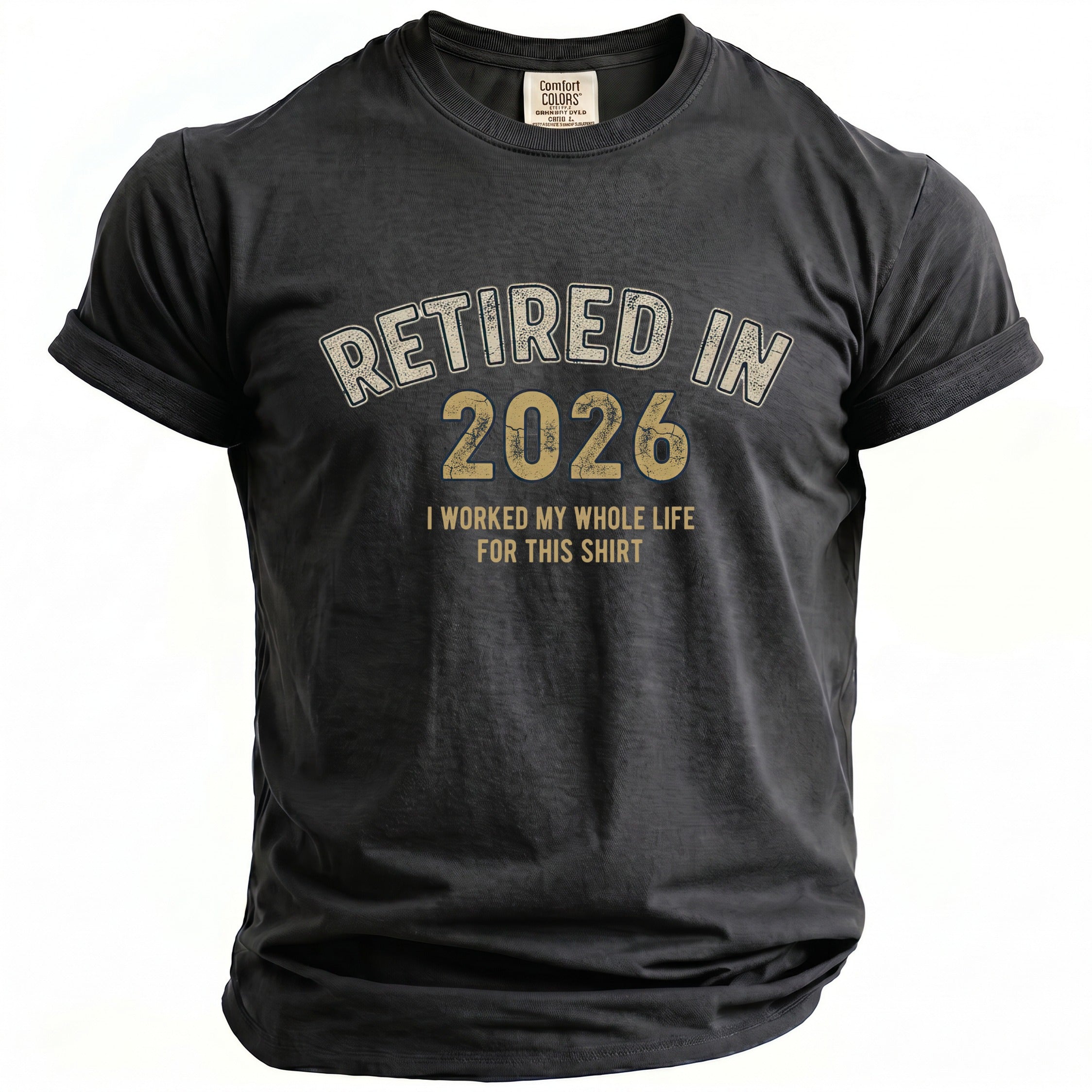 Charcoal t-shirt with "Retired in 2026" and "I worked my whole life for this shirt."