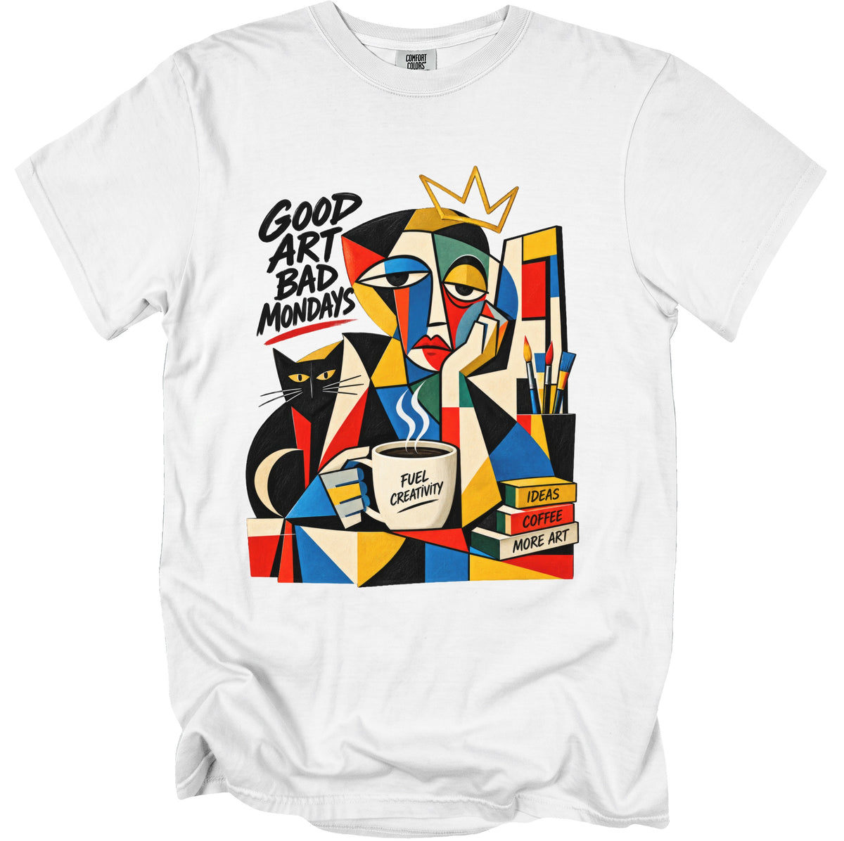 White t-shirt with abstract art featuring "Good Art Bad Mondays," a cat, and a coffee mug.