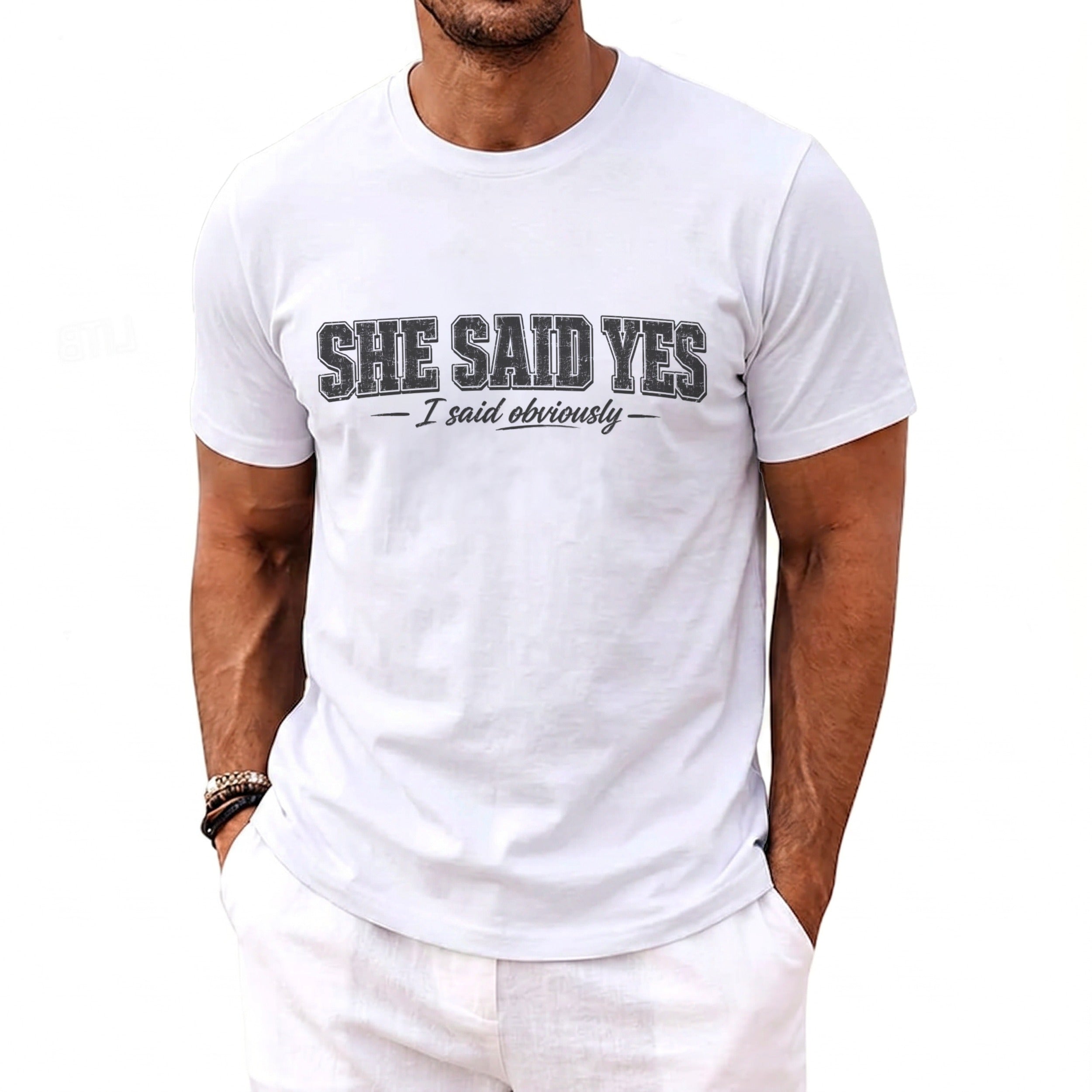 White t-shirt with "SHE SAID YES I said obviously" text graphic.