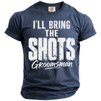 Navy t-shirt with white text reading "I'LL BRING THE SHOTS Groomsman".