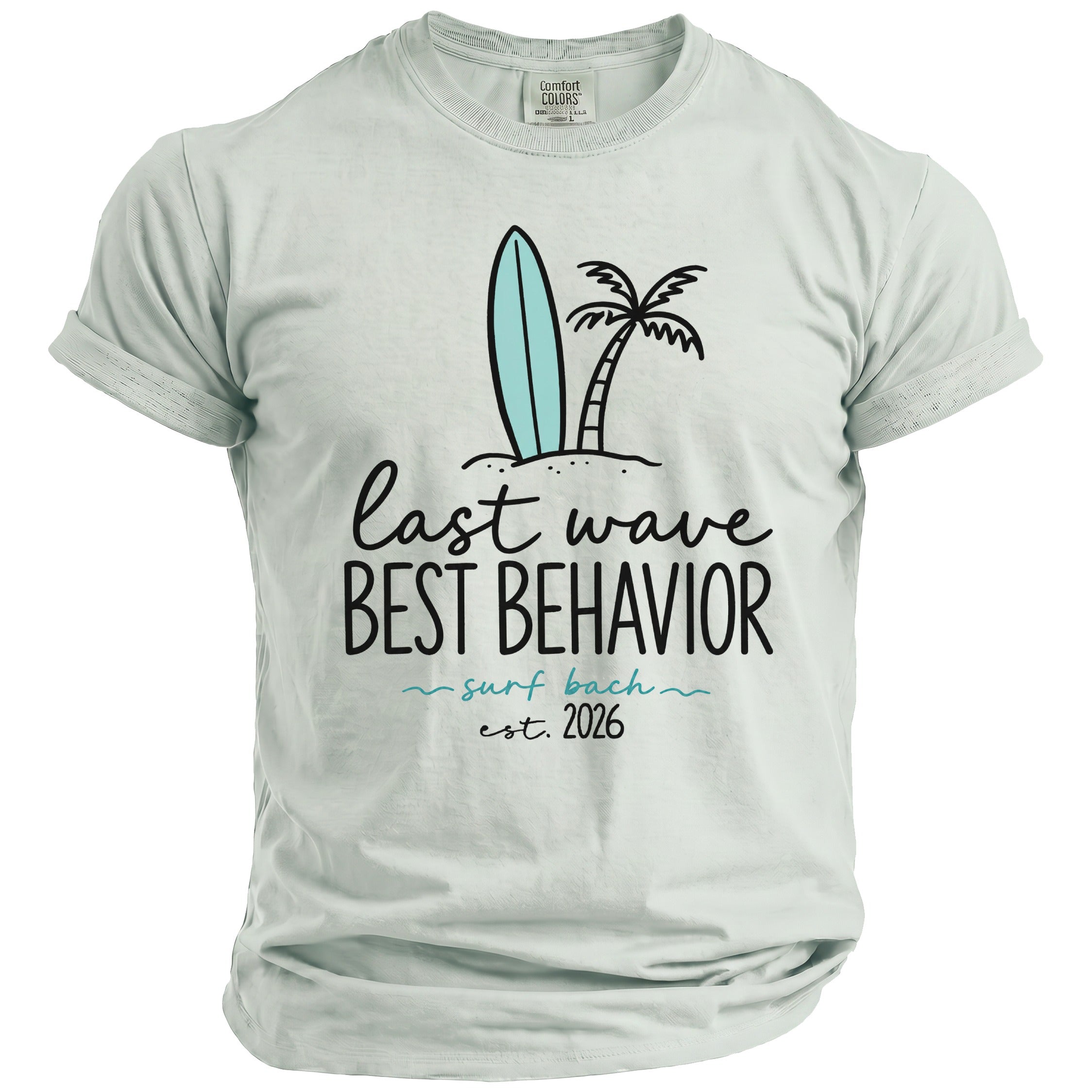 Light blue t-shirt with surf graphic and "last wave best behavior surf bach est. 2026" text.