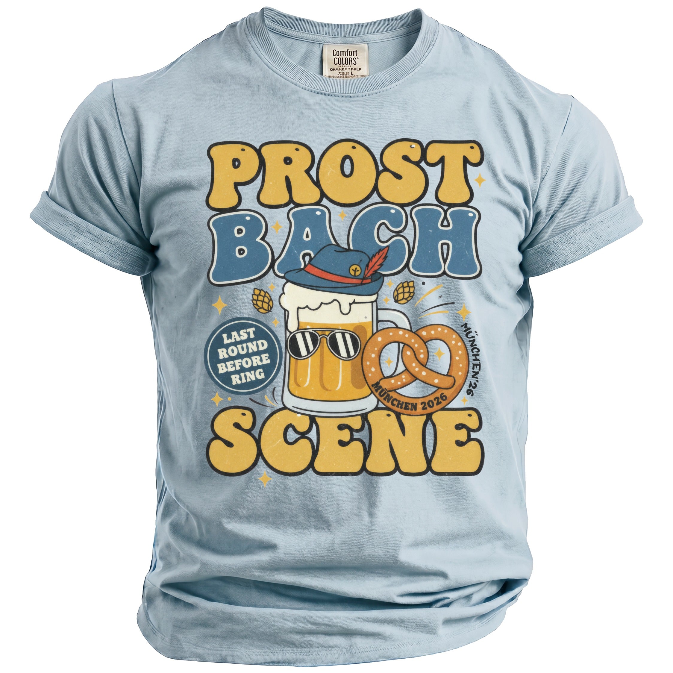 Light blue t-shirt with "Prost Bach Scene" text, beer mug, pretzel, and "München 2026".
