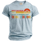 Light blue t-shirt with "Mike's Bachelor Party" and "The Final Countdown" text.