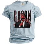 Light blue t-shirt with "Groom" text and a devilish man in a suit.