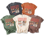 T-shirts in multiple colors featuring "UNDER NEW MANAGEMENT" and "MIKE'S BACH LA, CA" graphics.