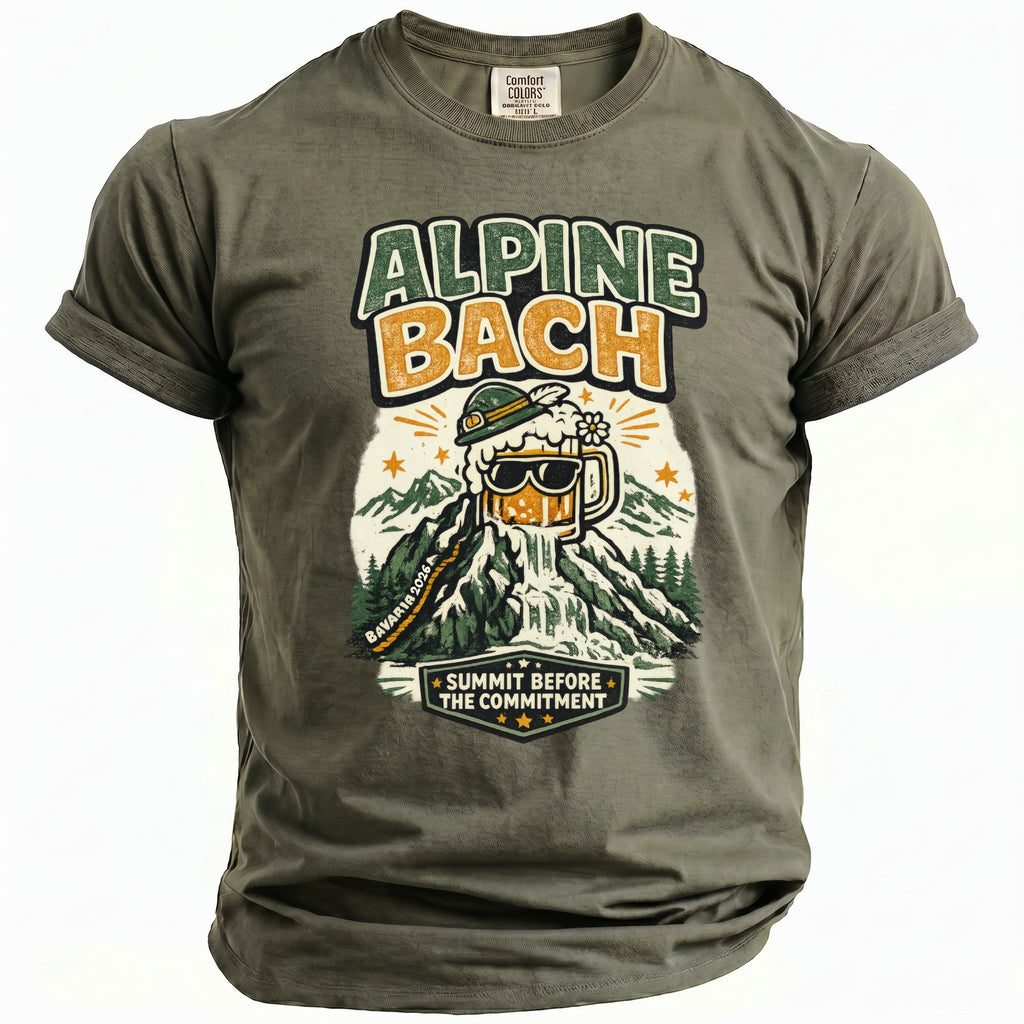 Green t-shirt with graphic of a beer mug on a mountain with text "ALPINE BACH" and "SUMMIT BEFORE THE COMMITMENT".