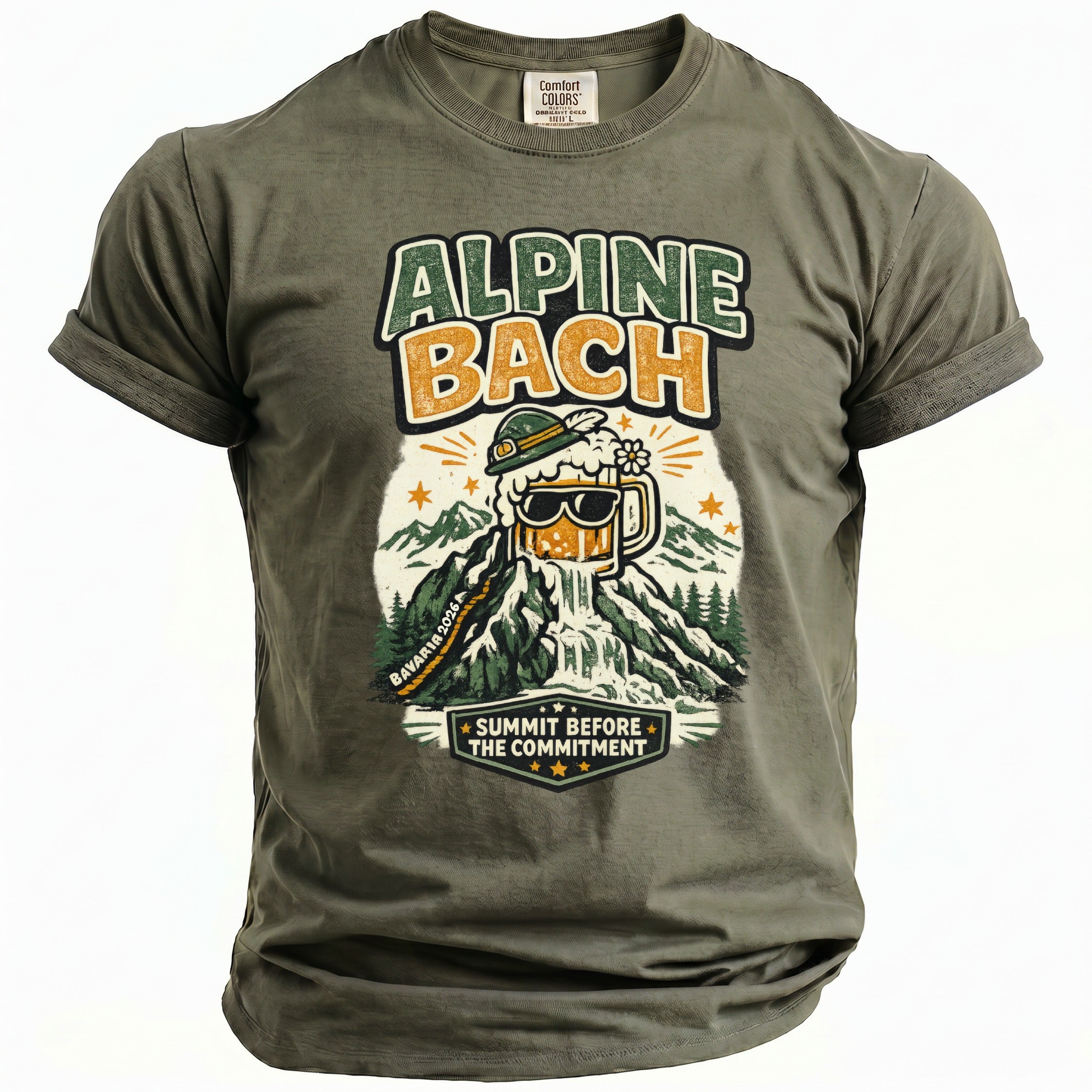 Green t-shirt with graphic of a beer mug on a mountain with text "ALPINE BACH" and "SUMMIT BEFORE THE COMMITMENT".