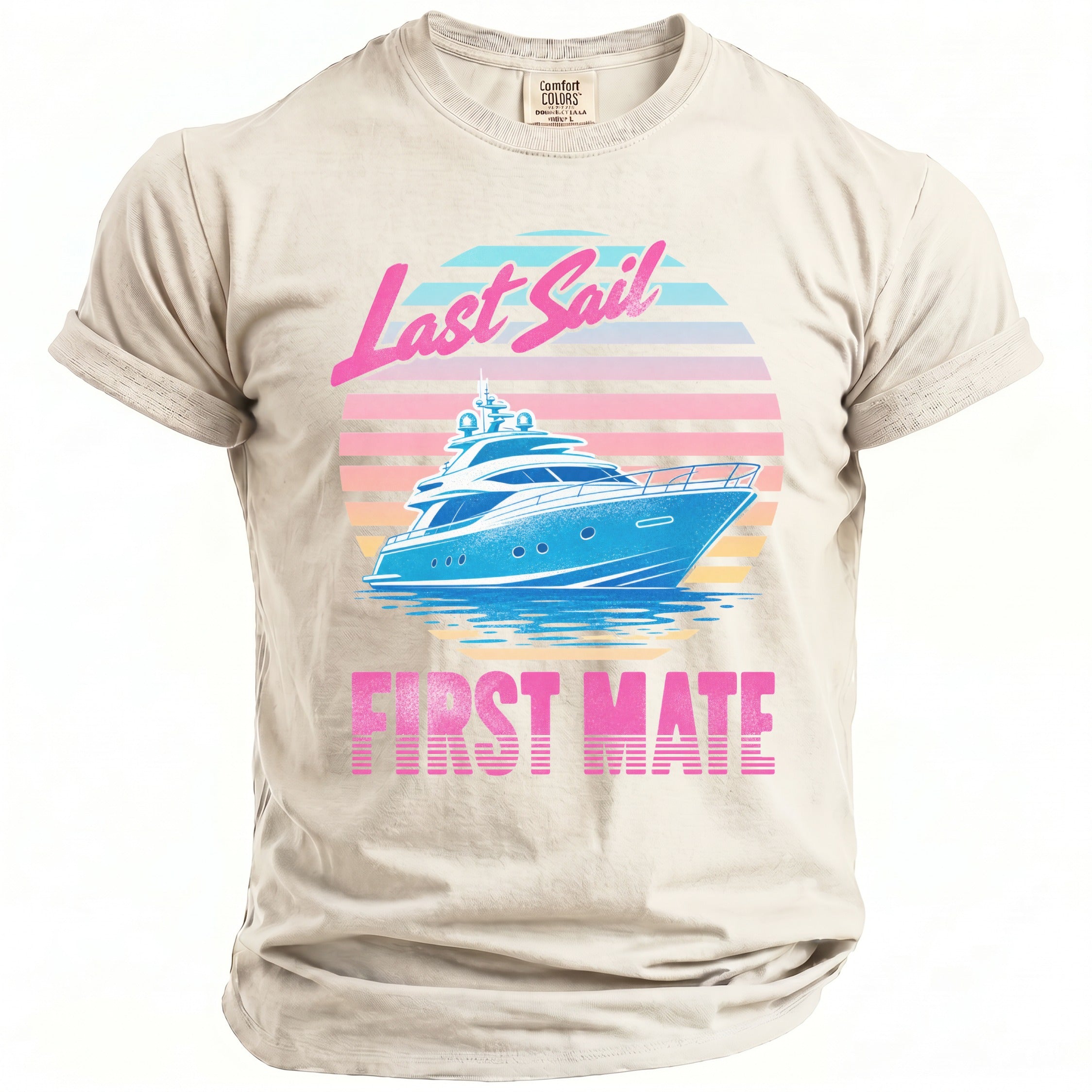 A cream-colored t-shirt featuring a retro graphic of a blue yacht and the text Last Sail First Mate.