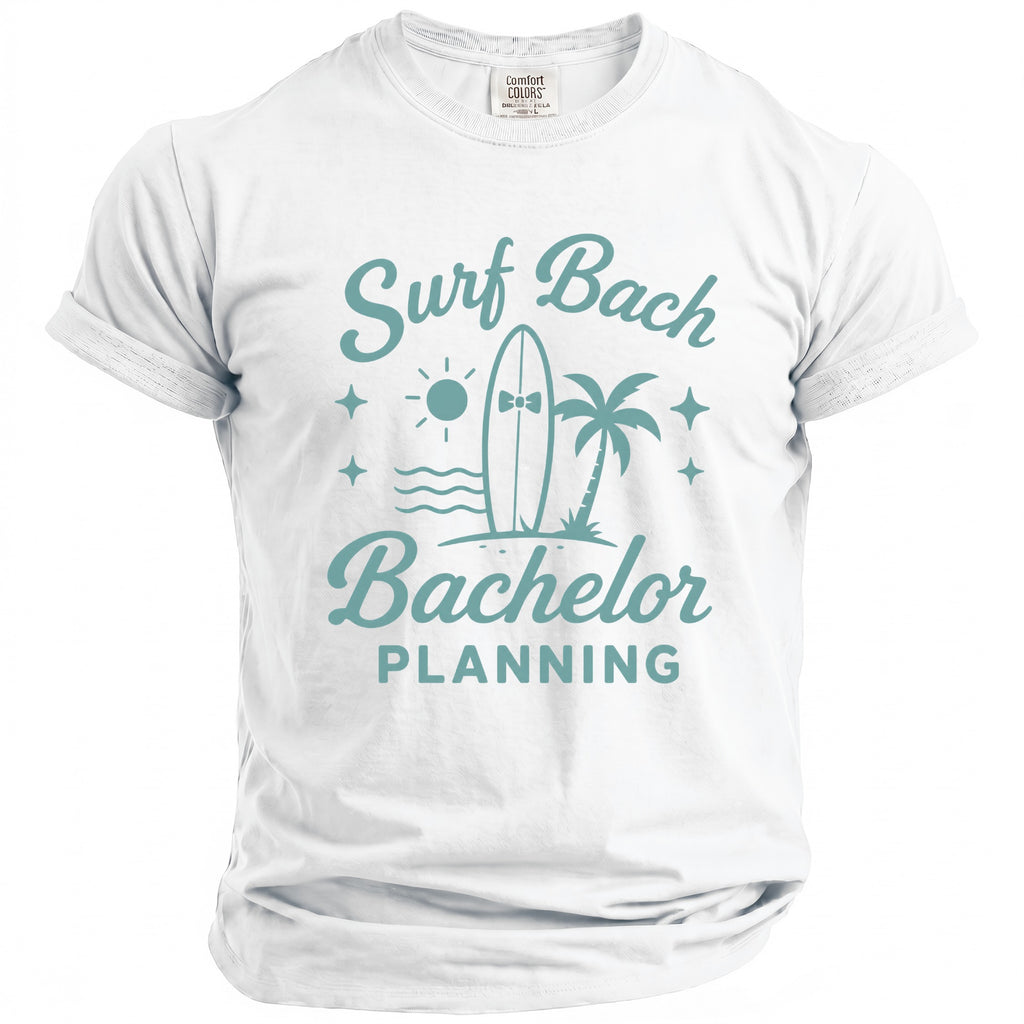White t-shirt with turquoise text and graphics reading "Surf Bachelor Planning".