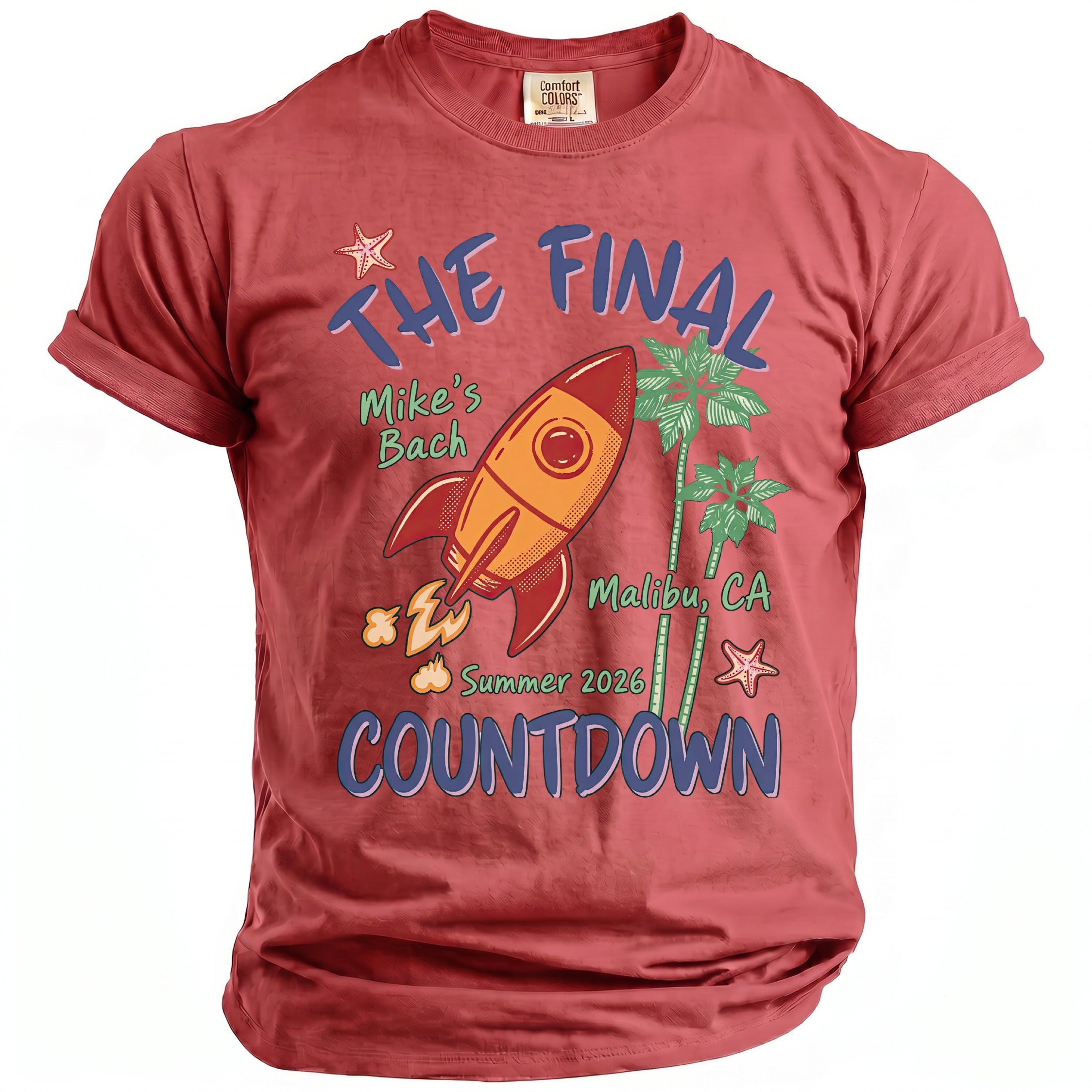Red t-shirt with "Mike's Bach", rocket, palm trees, and "The Final Countdown" text.
