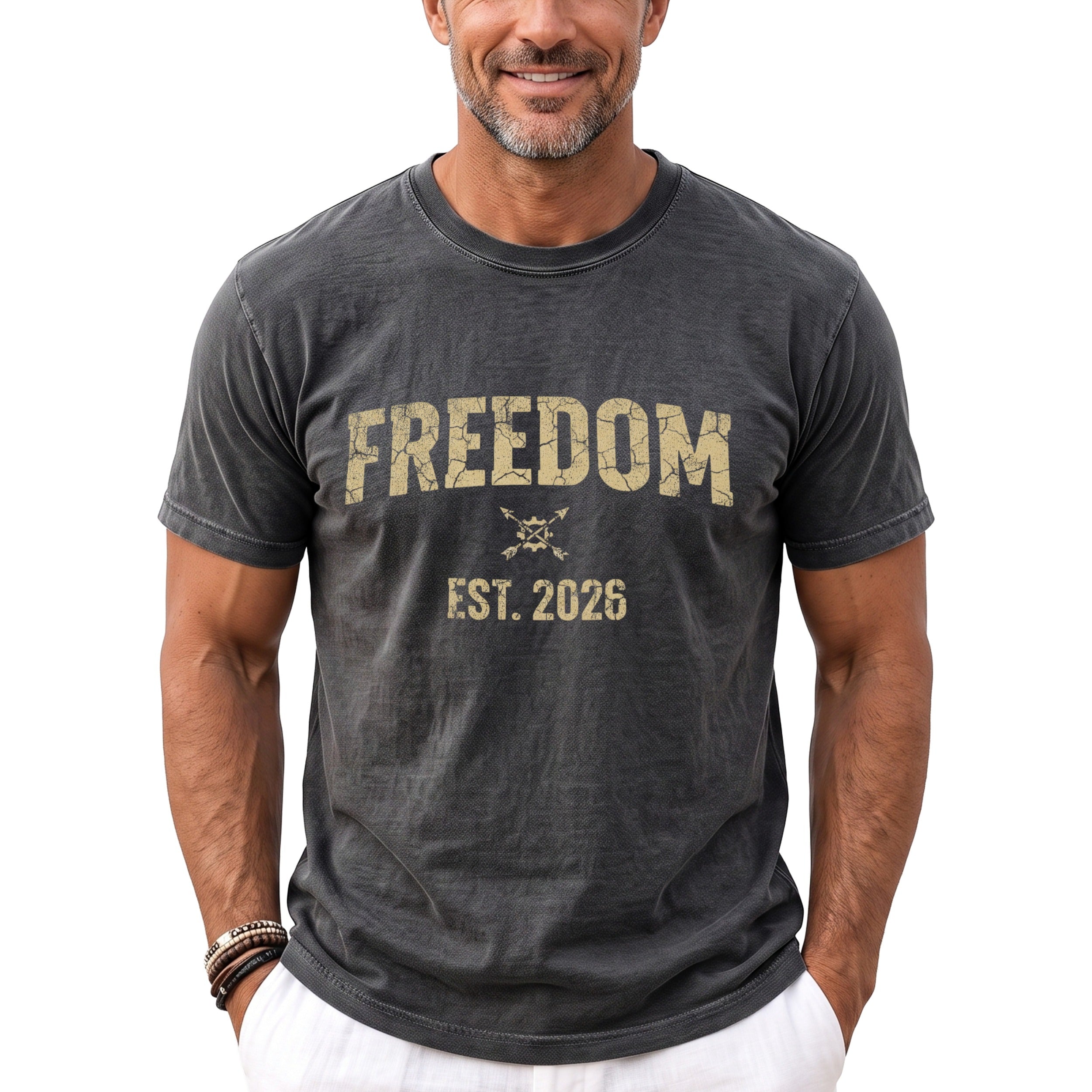 Dark grey t-shirt with "FREEDOM EST. 2026" printed on the front.