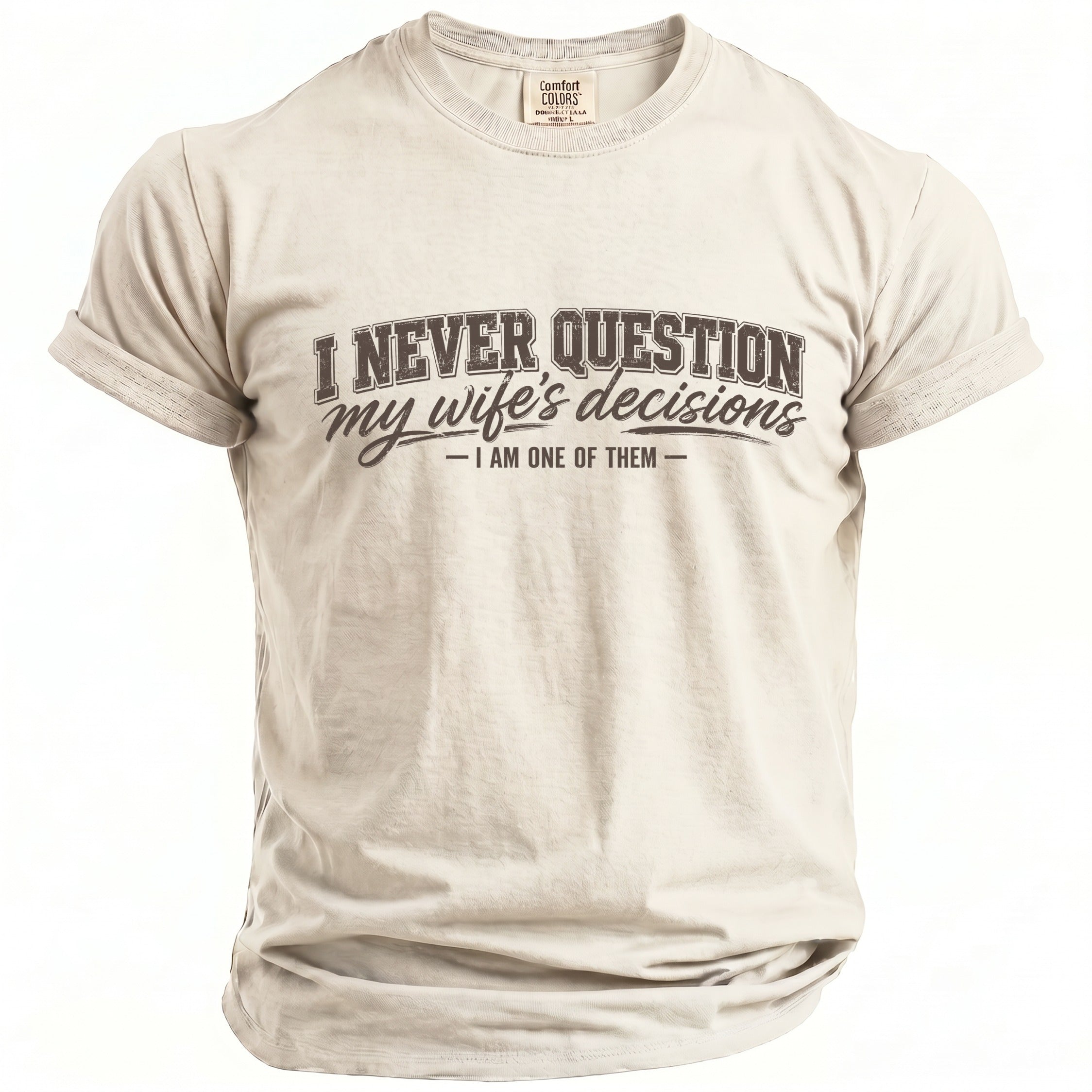 Beige t-shirt with text "I NEVER QUESTION my wife's decisions - I AM ONE OF THEM".