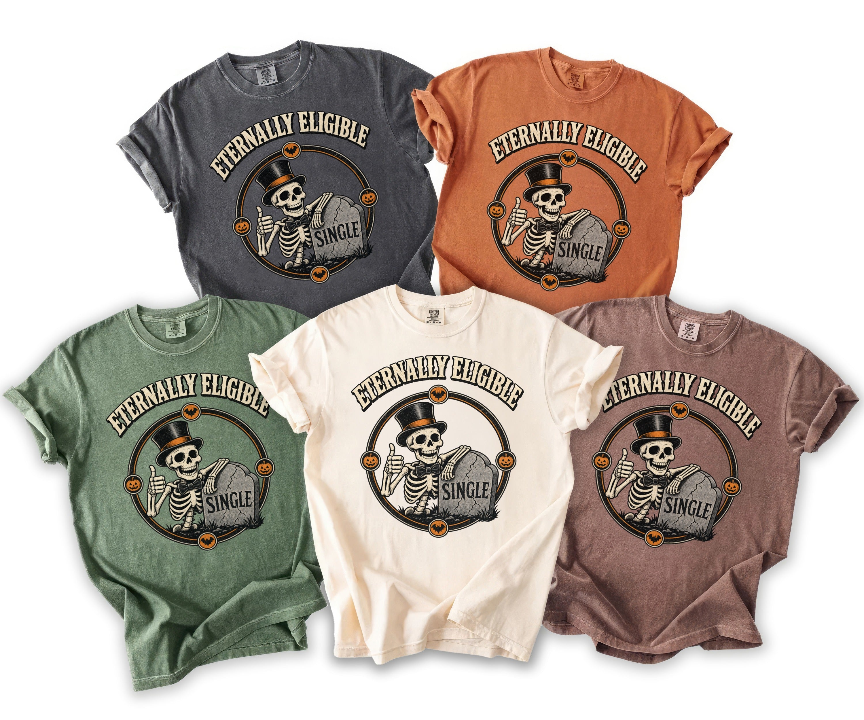 Five comfort colors t-shirts in grey, orange, green, cream, and brown, each displaying a skeleton graphic.