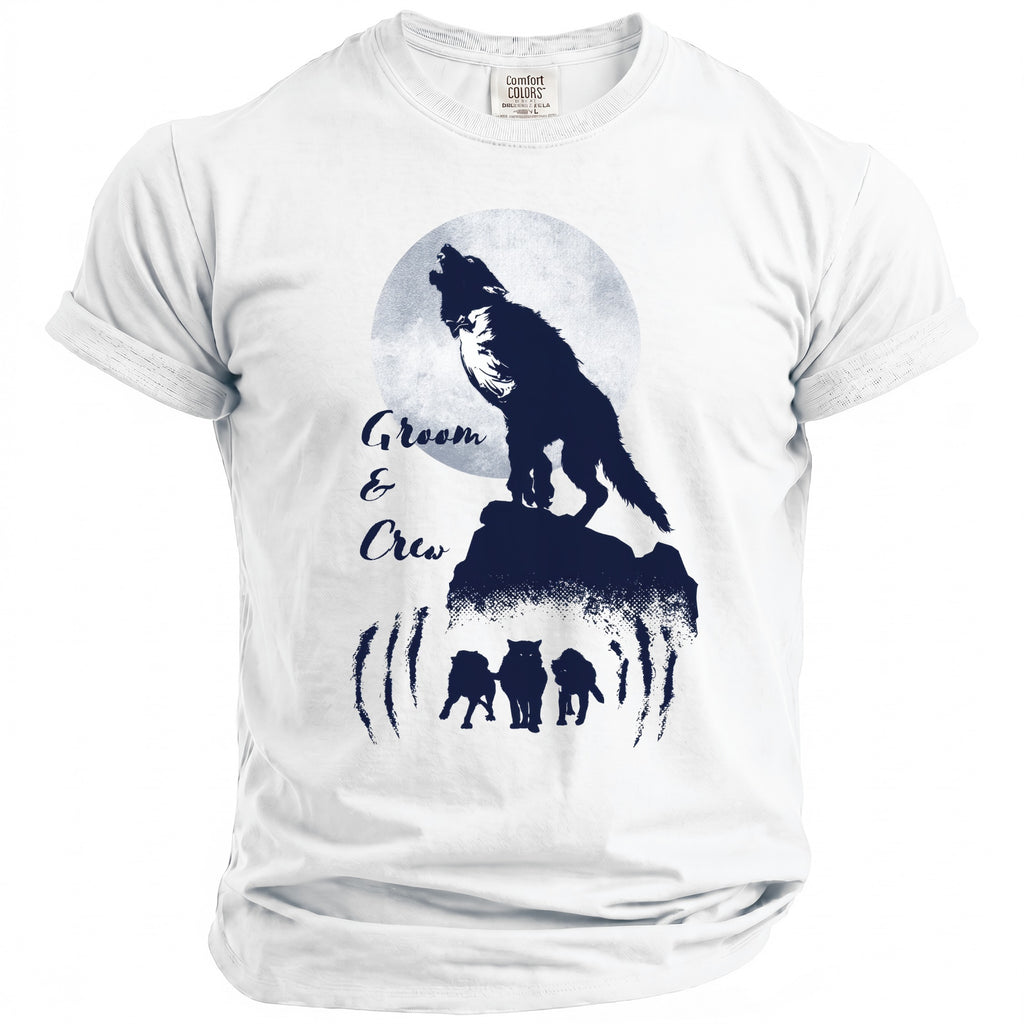 White t-shirt with a dark blue graphic of a wolf howling at the moon and "Groom & Crew" text.