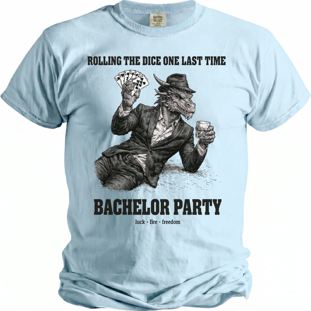 Light blue t-shirt with text "Rolling the Dice One Last Time" and a dragon holding cards and whiskey.