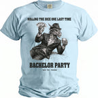 Light blue t-shirt with text "Rolling the Dice One Last Time" and a dragon holding cards and whiskey.