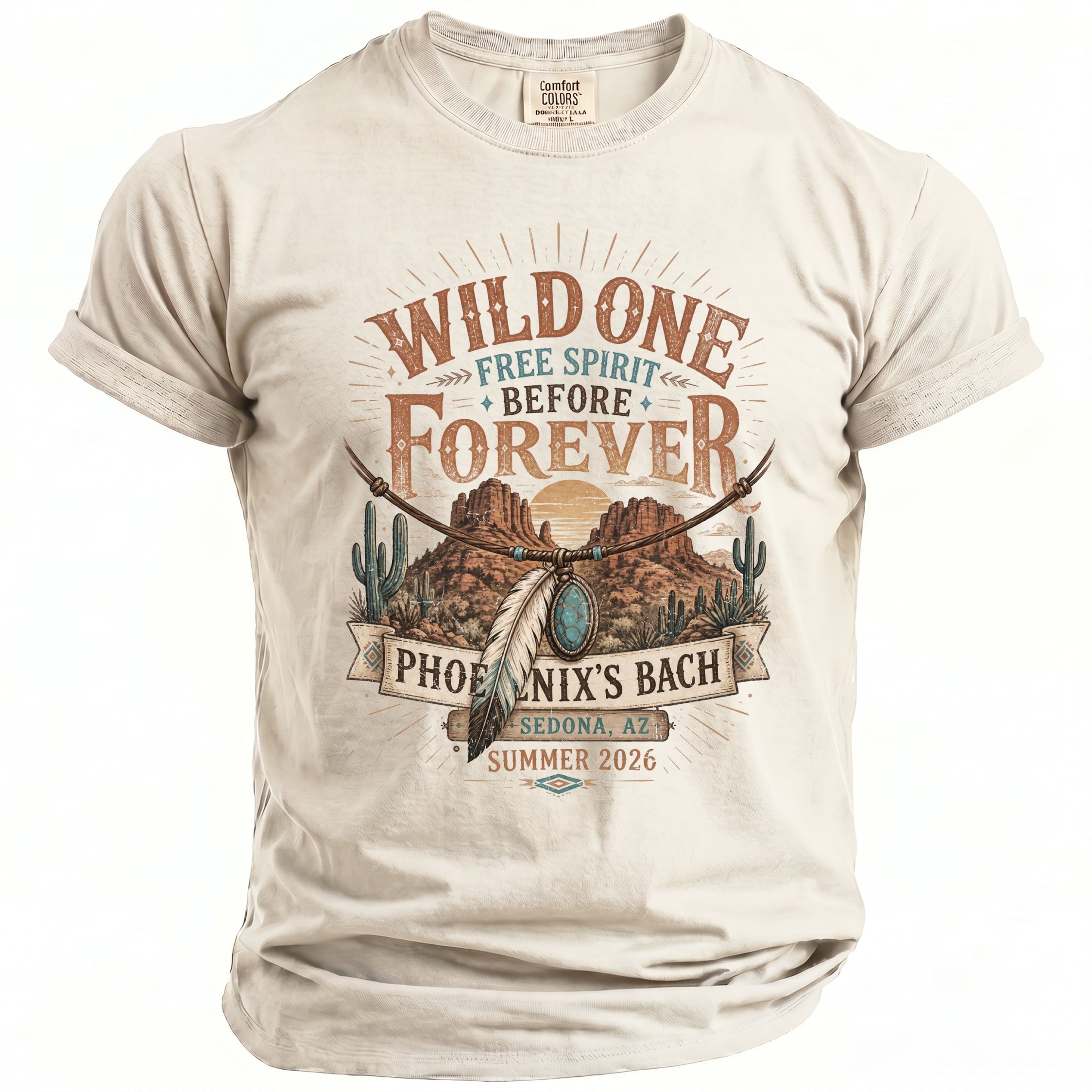 Light colored t-shirt with "Wild One Free Spirit Before Forever Phoenix's Bach Sedona, AZ Summer 2026" graphic.