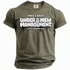Olive green t-shirt with "MIKE'S BACH UNDER NEW MANAGEMENT LA, CA SUMMER 2026" graphic.