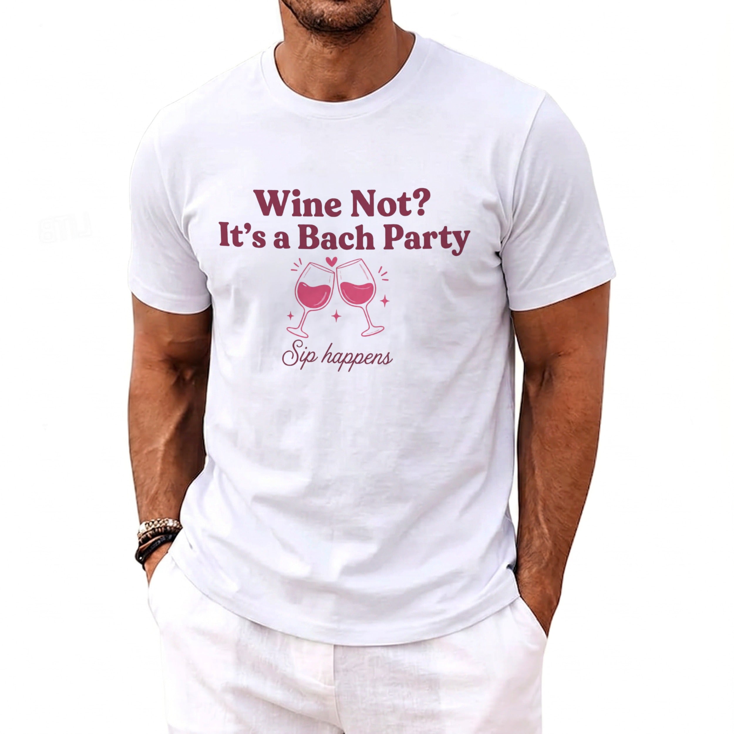 White t-shirt with "Wine Not? It's a Bach Party Sip happens" text and wine glasses.