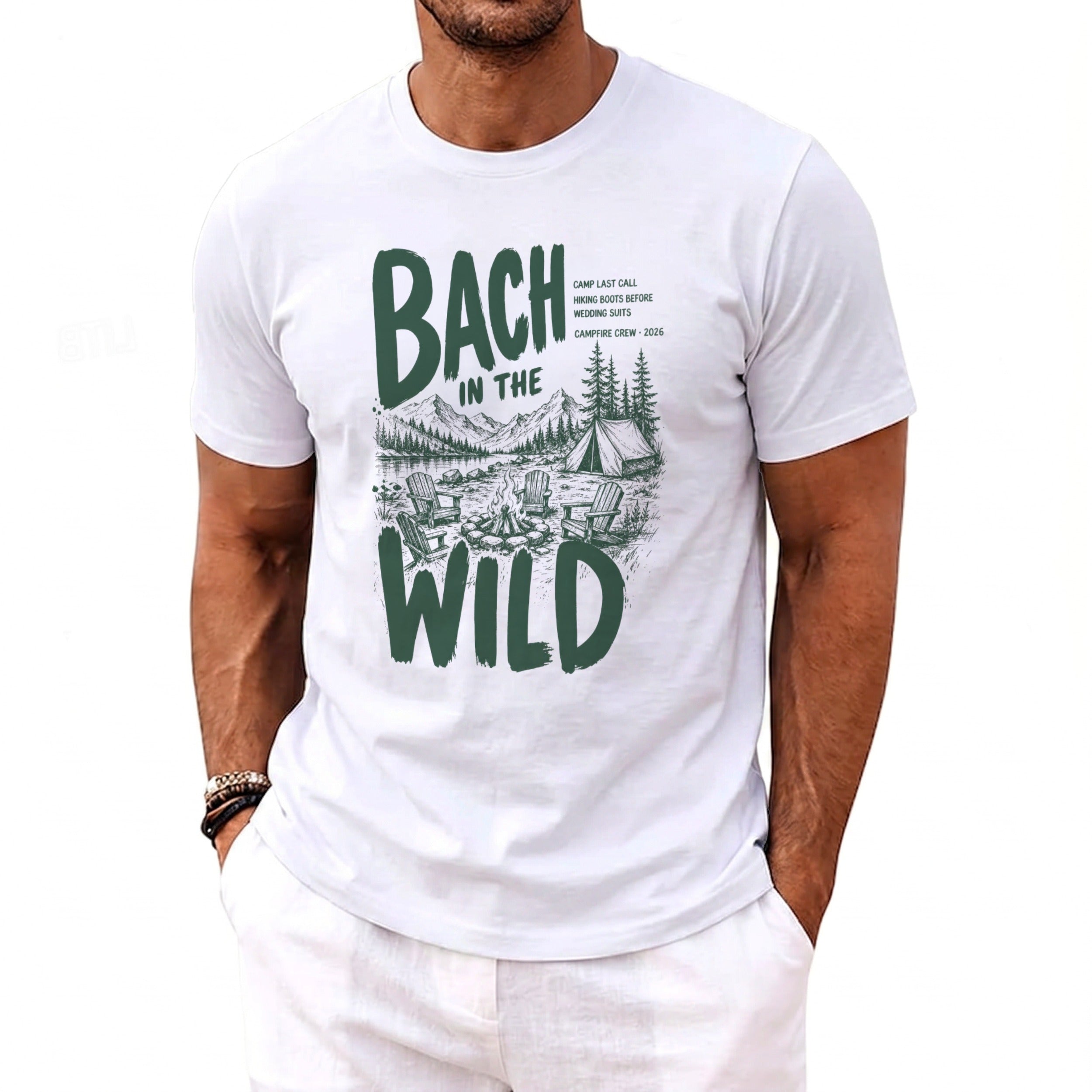 White t-shirt with "BACH IN THE WILD" graphic and camping scene.