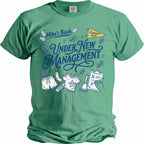 Green t-shirt with "Mike's Bach Under New Management Summer 2026" graphic.