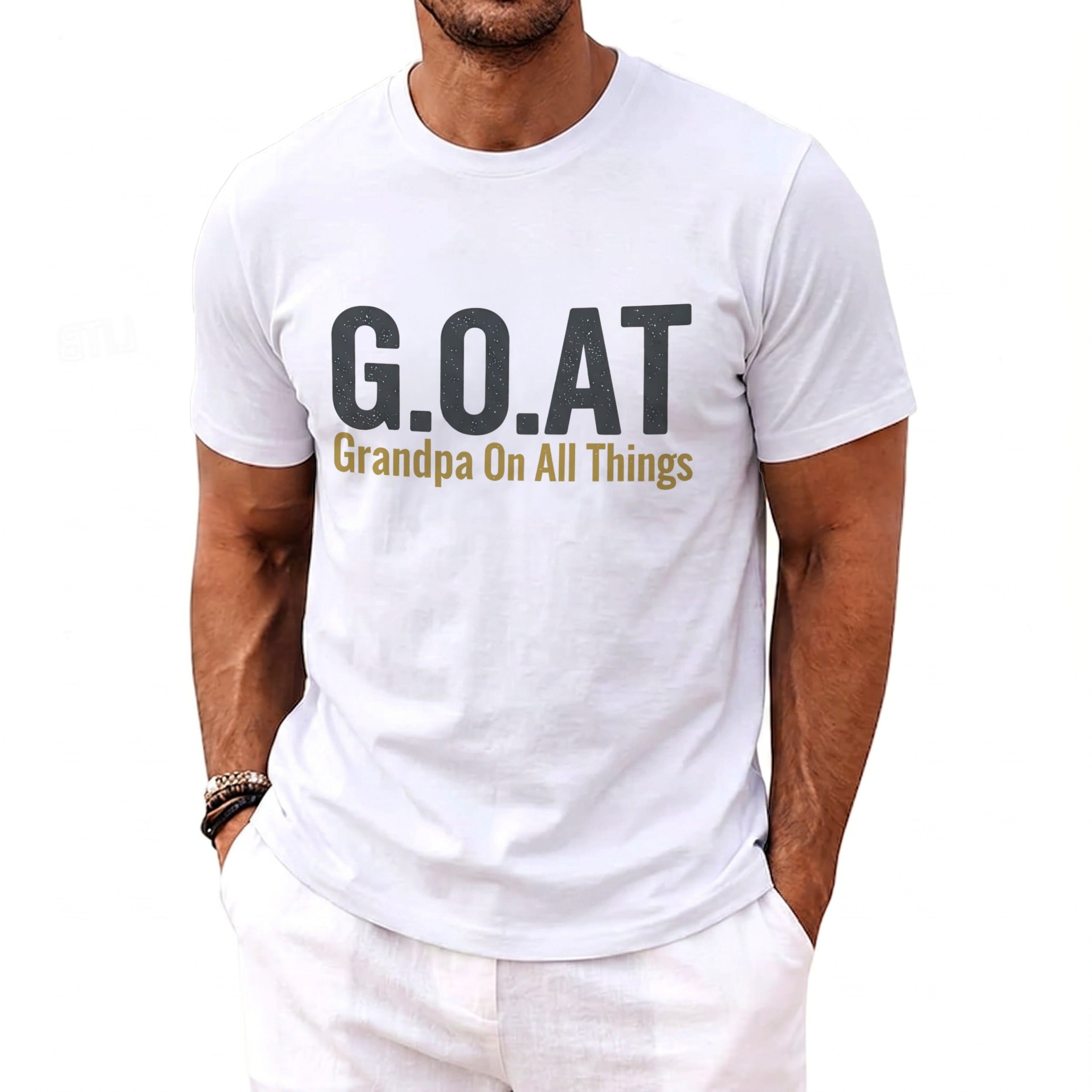 White t-shirt with "G.O.A.T Grandpa On All Things" text.
