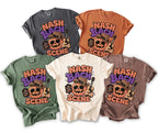 Five t-shirts in different colors with "Nash Bach Scene" text and pumpkin graphic.