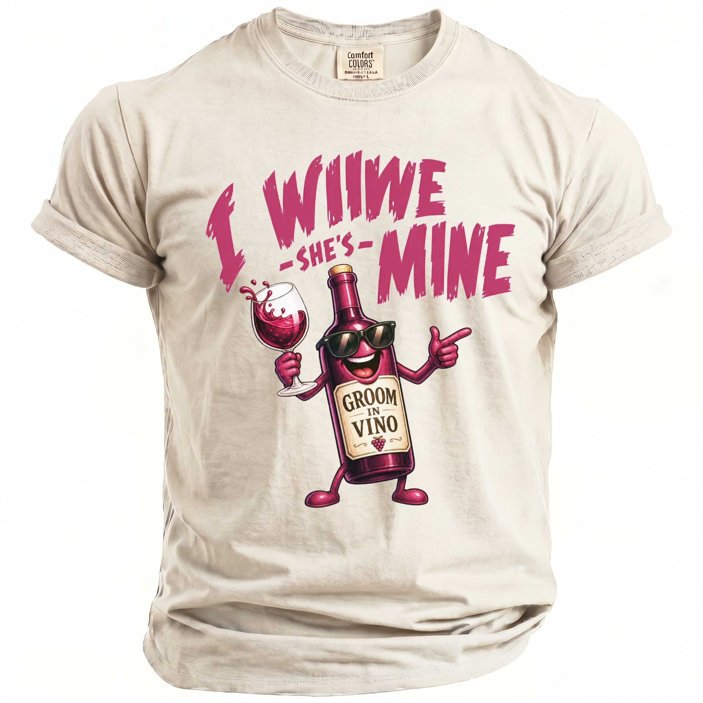 Cream t-shirt with pink text "I WINe -SHE'S-MINE" and cartoon wine bottle and glass.
